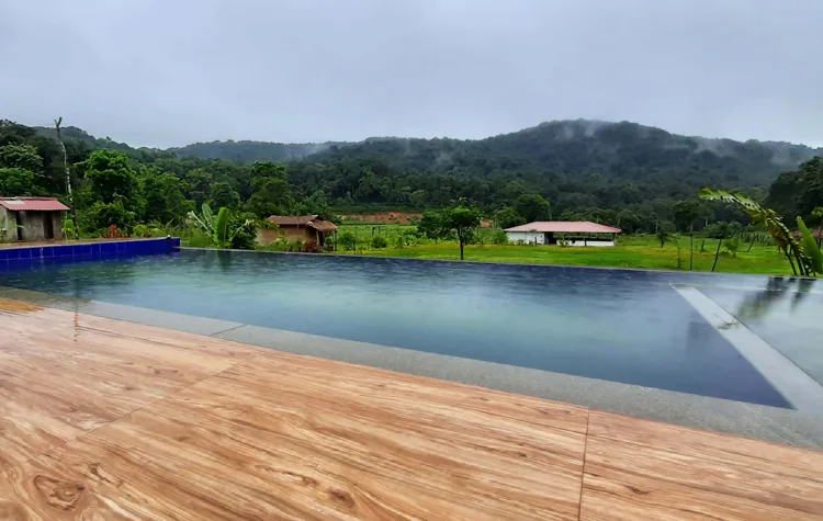 Swimming pool with mountain view at Dark Forest Resort Homestay Dandeli