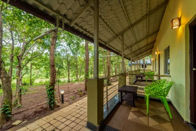 Cottage verandah looking into the forest at Jungle View Cottage Dandeli