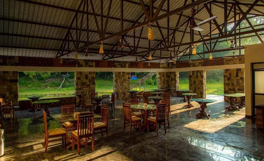 Open-air dining hall at Parampara Cottage Dandeli