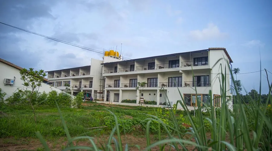 Modern white resort building with balconies at Starling River Resort